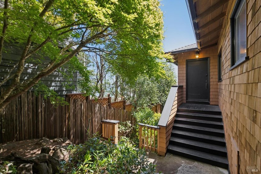 Desirable 3 unit building with a tenant-occupied studio! Located - photo 6
