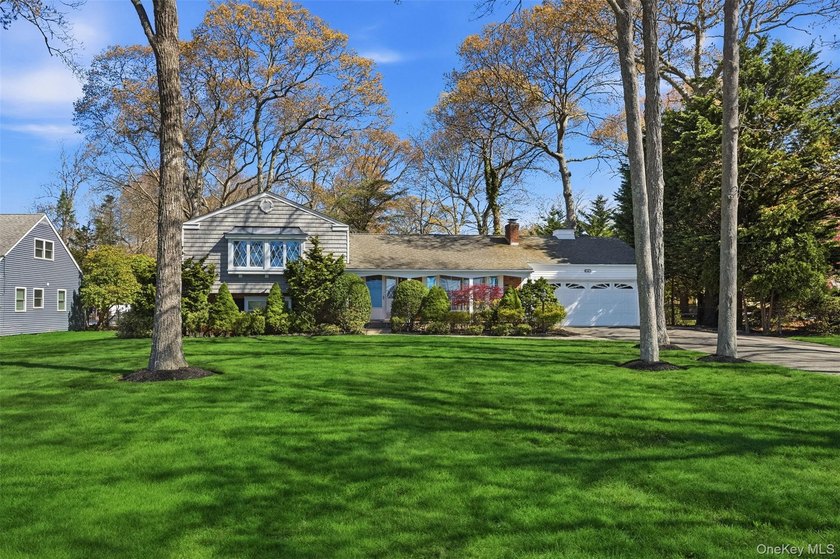 Desirable East Moriches location! This 3-bedroom, 2-bath - photo 3