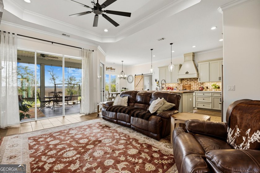 SHOWING LIKE A MODEL HOME, this exceptional custom-built - photo 12