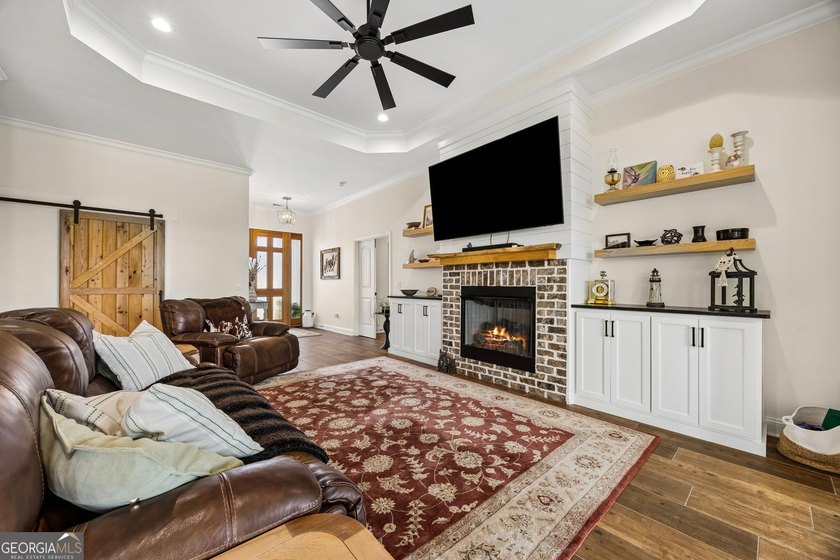SHOWING LIKE A MODEL HOME, this exceptional custom-built - photo 14