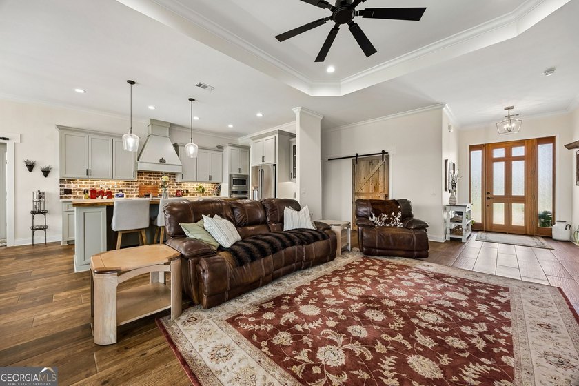 SHOWING LIKE A MODEL HOME, this exceptional custom-built - photo 15