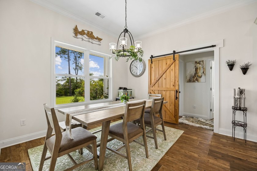 SHOWING LIKE A MODEL HOME, this exceptional custom-built - photo 20