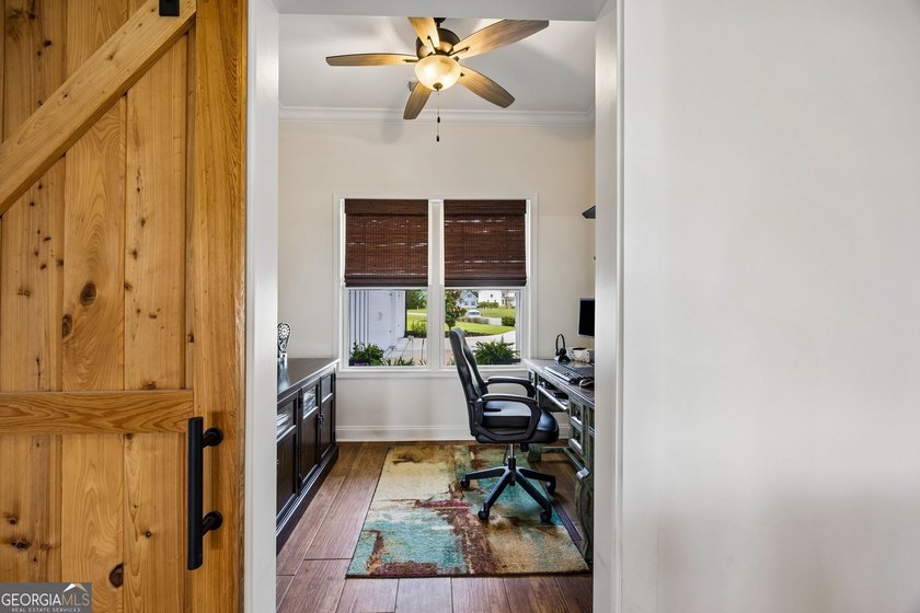 SHOWING LIKE A MODEL HOME, this exceptional custom-built - photo 22
