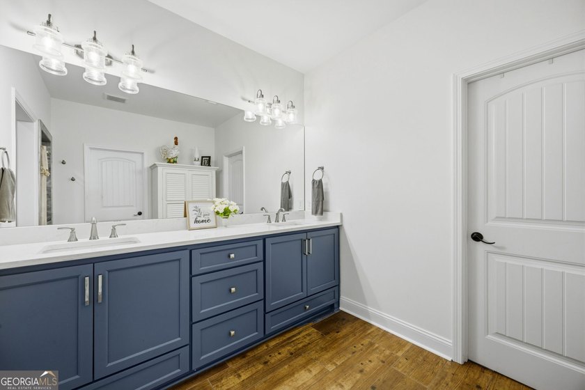 SHOWING LIKE A MODEL HOME, this exceptional custom-built - photo 28