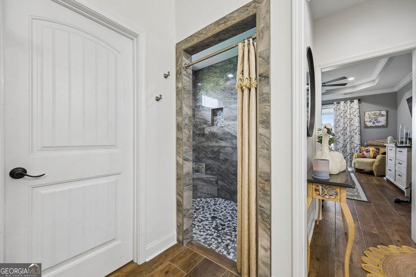 SHOWING LIKE A MODEL HOME, this exceptional custom-built - photo 29