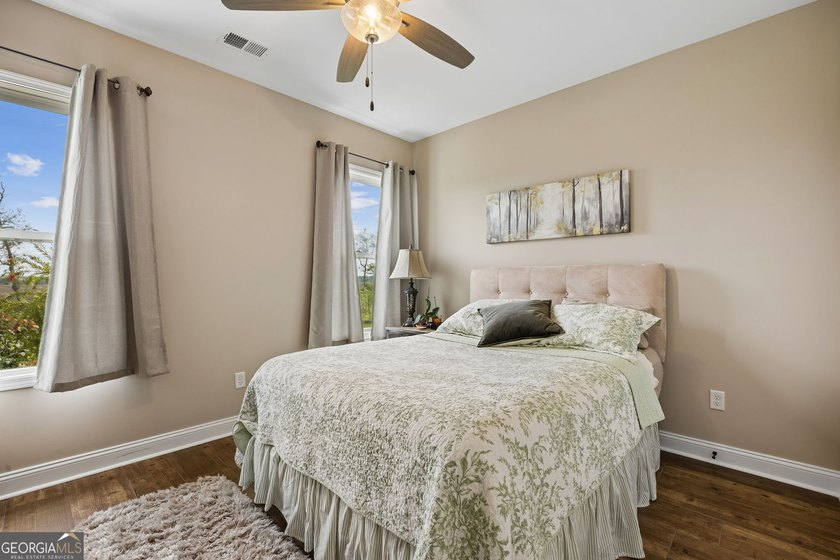 SHOWING LIKE A MODEL HOME, this exceptional custom-built - photo 35