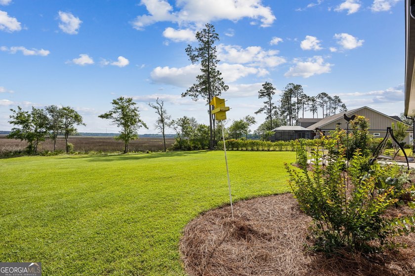 SHOWING LIKE A MODEL HOME, this exceptional custom-built - photo 50