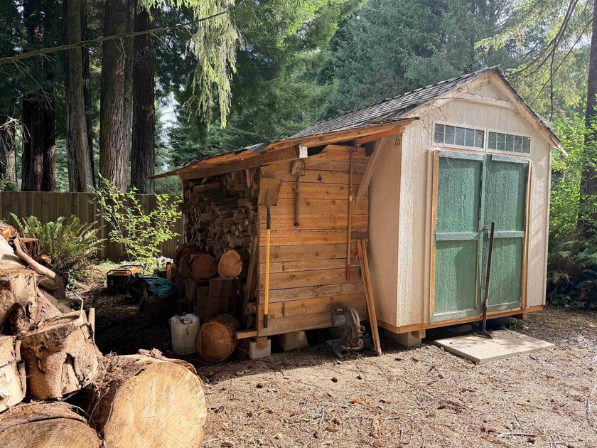 Tucked beneath a majestic canopy of towering Redwoods, this rare - photo 8