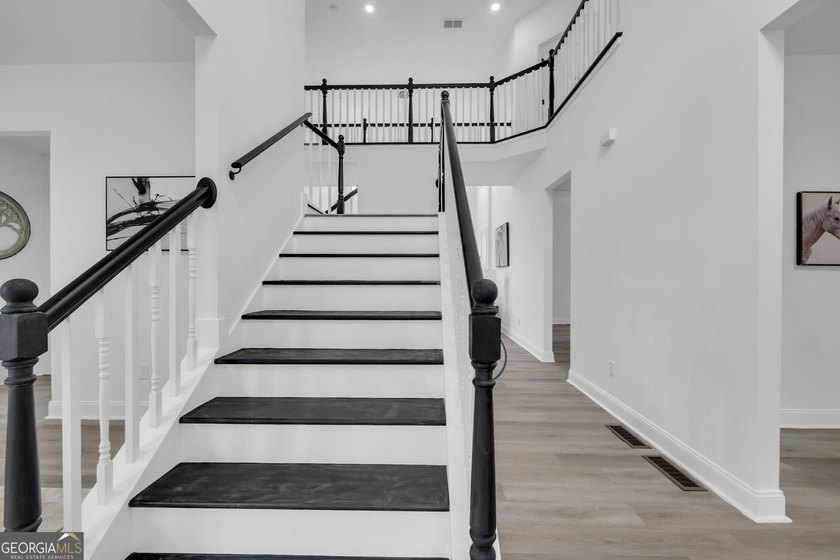This stunning newly built residence in Douglasville offers the - photo 3