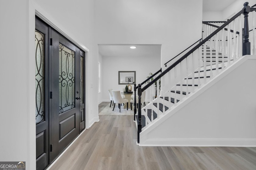 This stunning newly built residence in Douglasville offers the - photo 5
