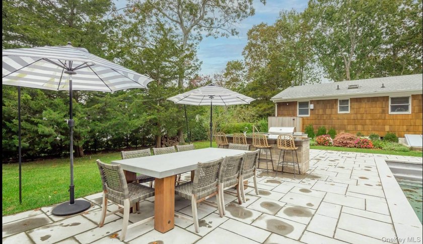 Indoor-Outdoor Living in Hampton Bays Situated south of the - photo 4