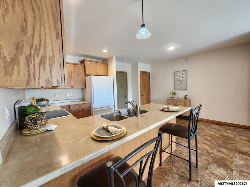 LUXURY LIVING AT AN AFFORDABLE PRICE! GARDEN PARK VILLAGE CONDOS - photo 4