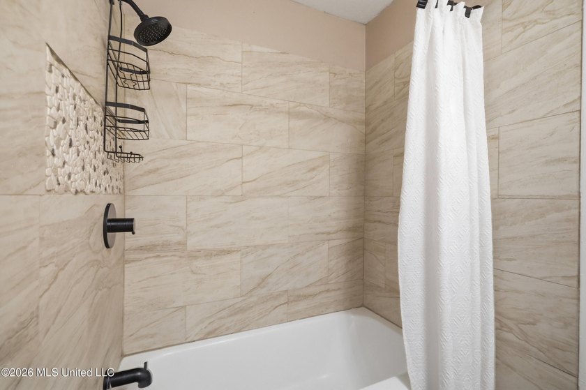 Welcome home to this beautifully updated 4-bedroom, 2-bath home - photo 19