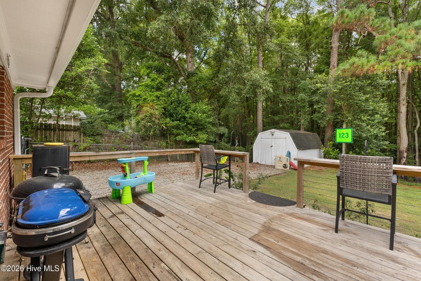 Nestled on a quiet, tree-lined street in an established - photo 22