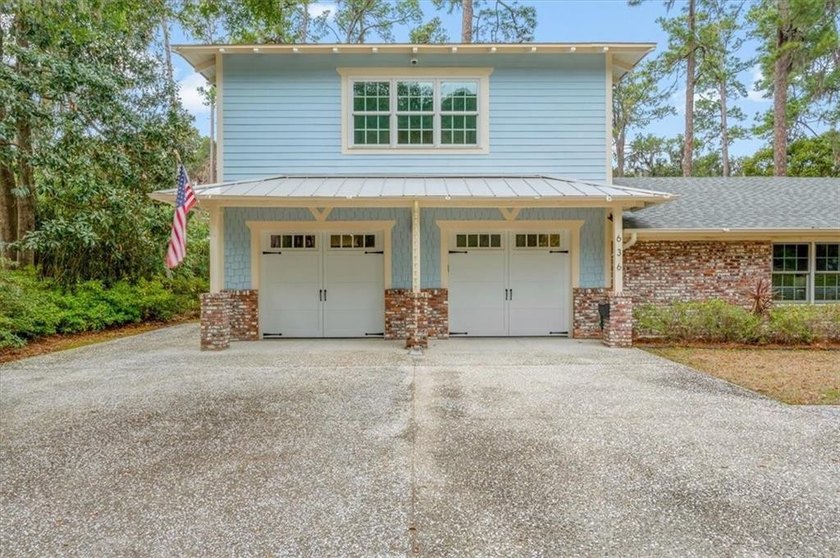 Set beneath a quiet canopy of live oaks, 636 Old Plantation Road - photo 9