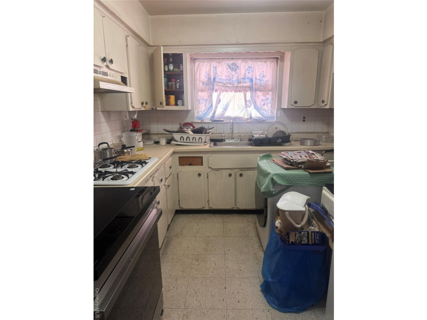 Excellent opportunity to own a brick semi-attached two-family - photo 4