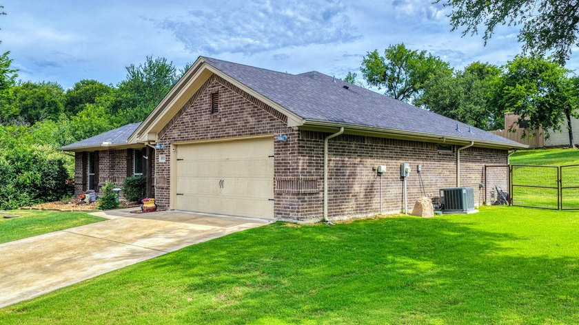 This stunning home is in pristine condition and sits on an - photo 4