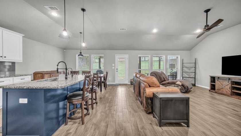 This stunning home is in pristine condition and sits on an - photo 7