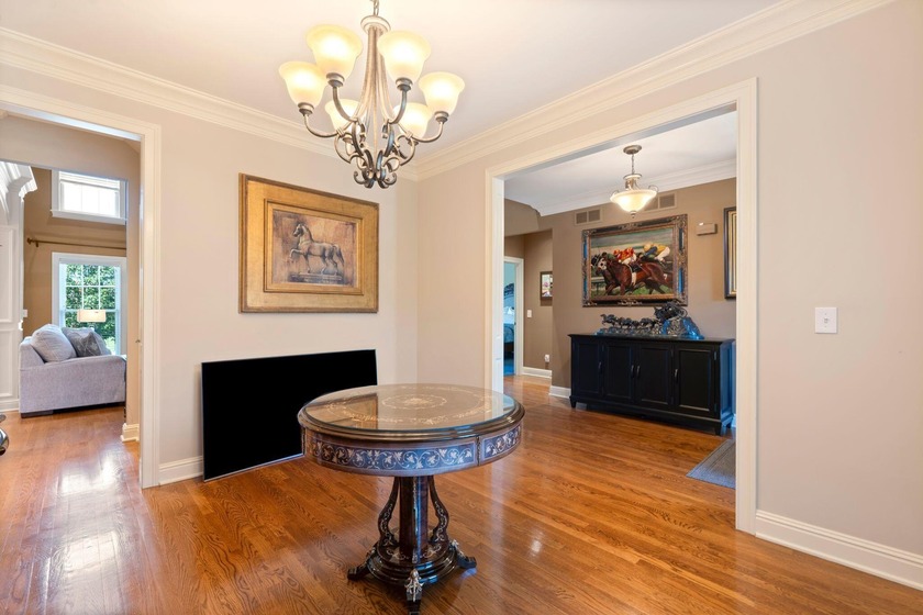 Welcome to this stunning 5-bedroom, 4.5-bathroom home located in - photo 11