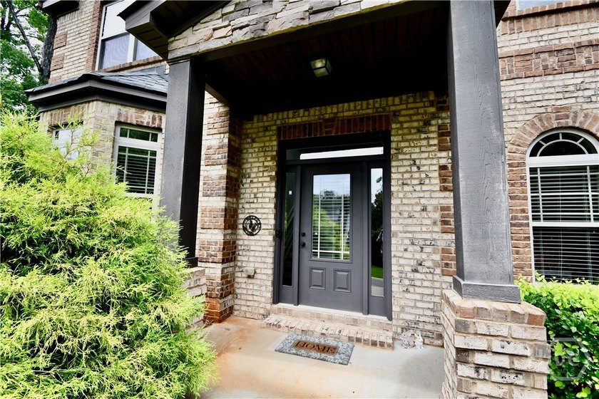 Welcome to 1140 Riverhill Drive, an exceptional residence - photo 3