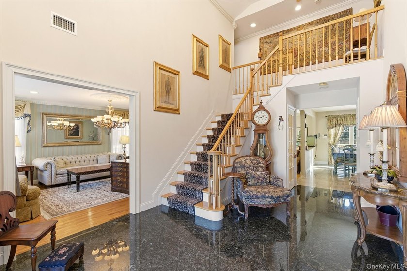FLOWER HILL, ROSLYN | BRICK CENTER HALL COLONIAL. Located on a - photo 4