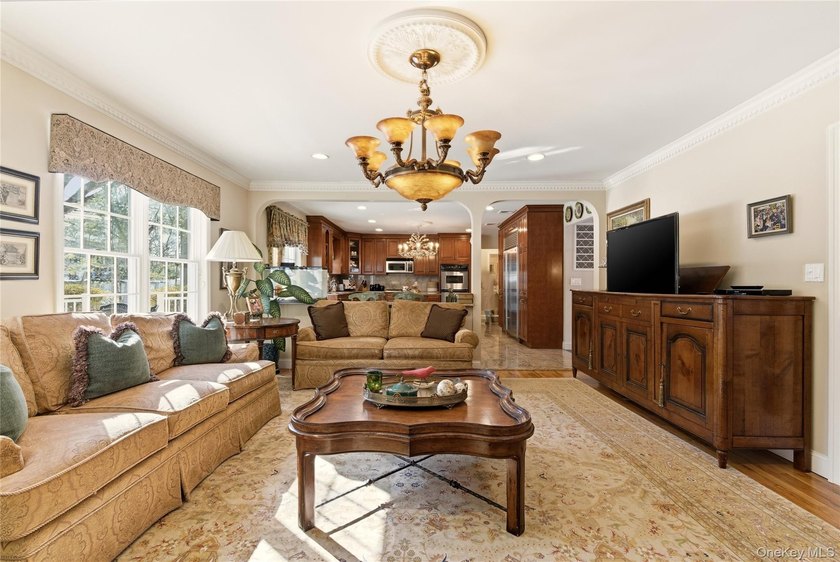 FLOWER HILL, ROSLYN | BRICK CENTER HALL COLONIAL. Located on a - photo 8
