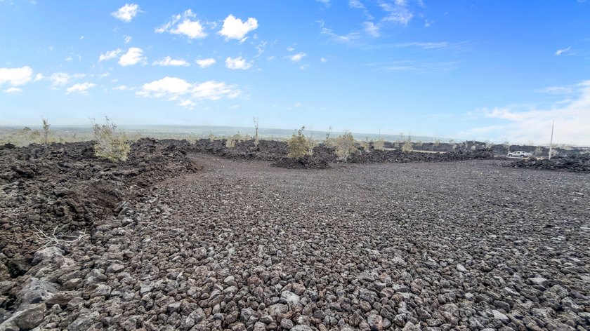 Nestled in the gated community of Kona Garden Estates, this - photo 17