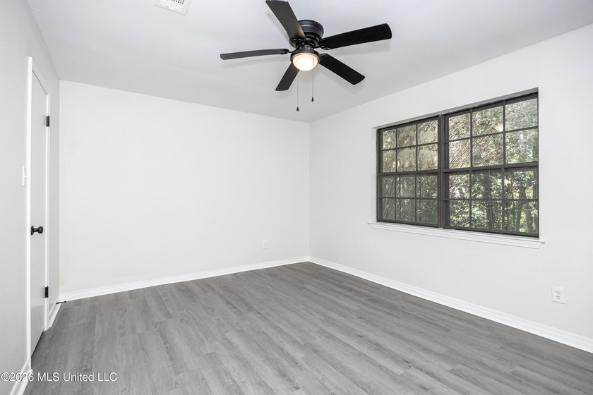 Stunning newly renovated white brick home in DOWNTOWN GOLF CART - photo 20