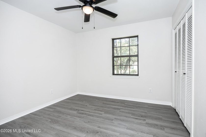 Stunning newly renovated white brick home in DOWNTOWN GOLF CART - photo 22