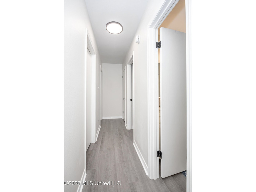 Stunning newly renovated white brick home in DOWNTOWN GOLF CART - photo 23