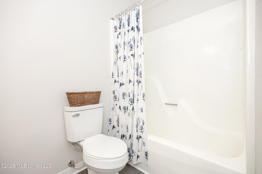 Stunning newly renovated white brick home in DOWNTOWN GOLF CART - photo 25