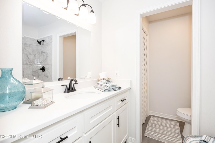 Stunning newly renovated white brick home in DOWNTOWN GOLF CART - photo 32
