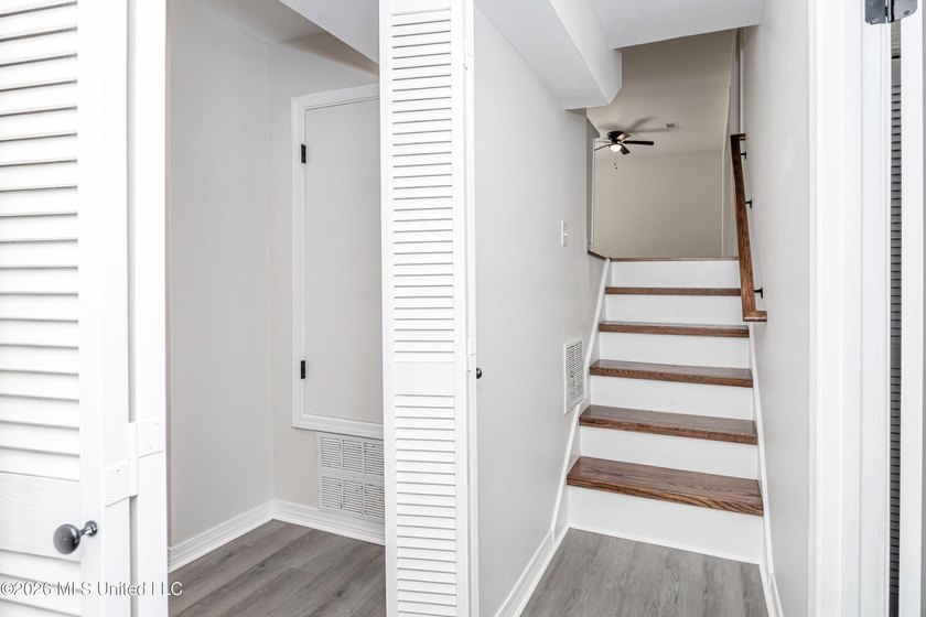 Stunning newly renovated white brick home in DOWNTOWN GOLF CART - photo 36