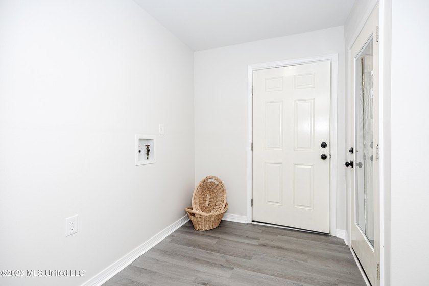 Stunning newly renovated white brick home in DOWNTOWN GOLF CART - photo 50