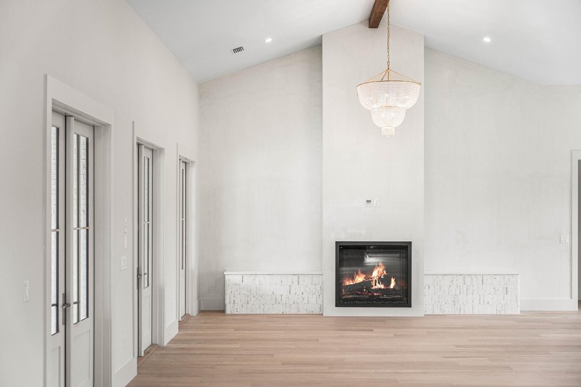 A showstopper of modern coastal elegance, 36 Sandcord Drive is a - photo 13