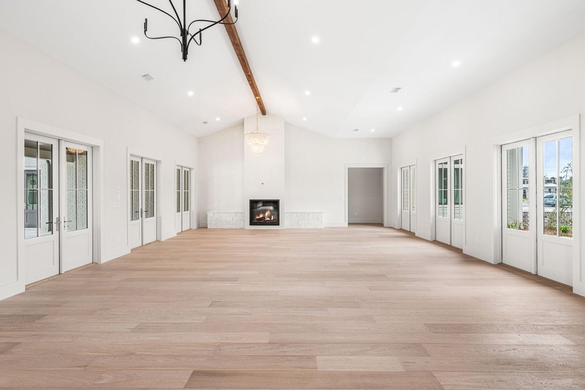 A showstopper of modern coastal elegance, 36 Sandcord Drive is a - photo 14