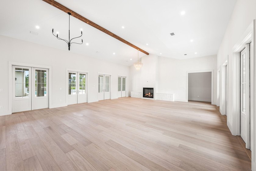 A showstopper of modern coastal elegance, 36 Sandcord Drive is a - photo 15