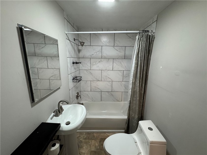 Check out this side-by-side duplex in North Winton Village! With - photo 17