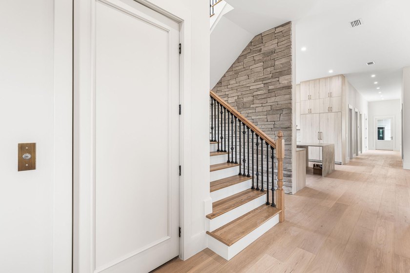 A showstopper of modern coastal elegance, 36 Sandcord Drive is a - photo 27