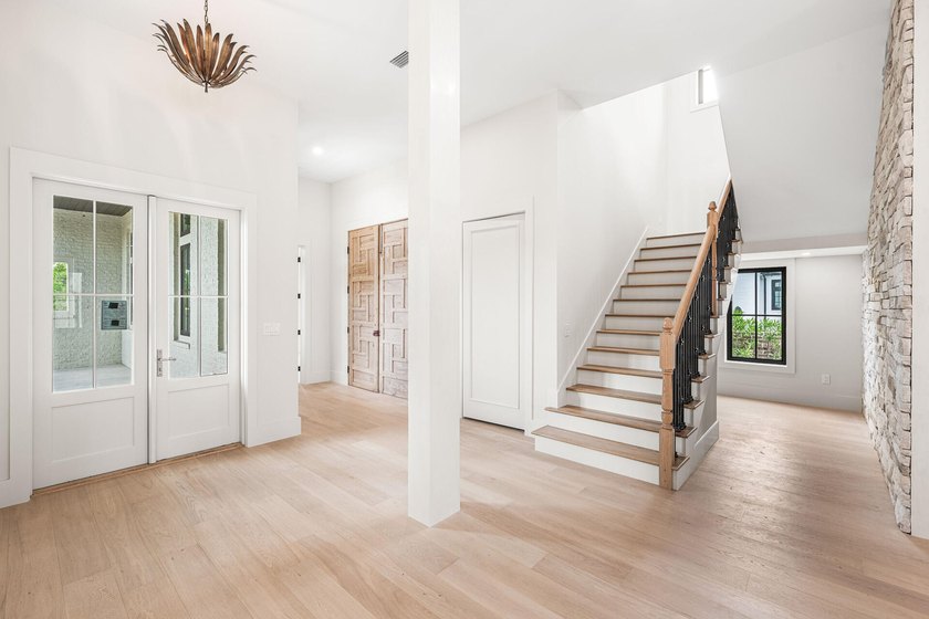 A showstopper of modern coastal elegance, 36 Sandcord Drive is a - photo 28