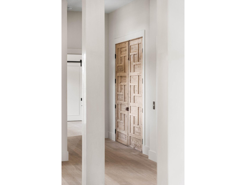 A showstopper of modern coastal elegance, 36 Sandcord Drive is a - photo 29