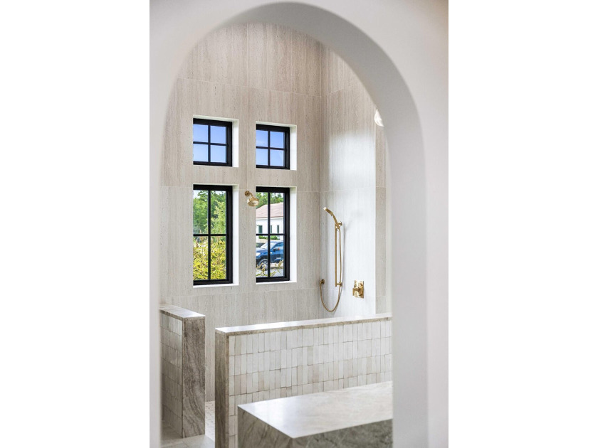 A showstopper of modern coastal elegance, 36 Sandcord Drive is a - photo 40