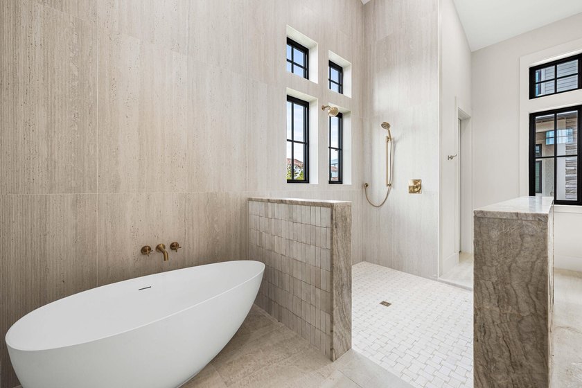 A showstopper of modern coastal elegance, 36 Sandcord Drive is a - photo 43