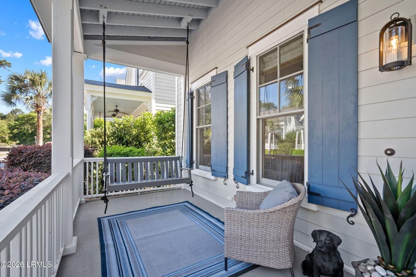 Set along one of Habersham's most charming streets, framed by a - photo 17
