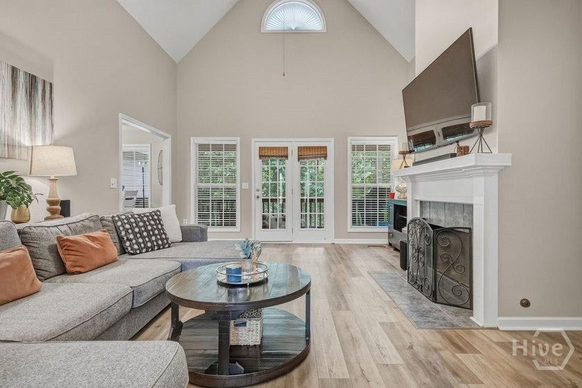 The classic brick &amp; siding exterior welcomes you with a - photo 8