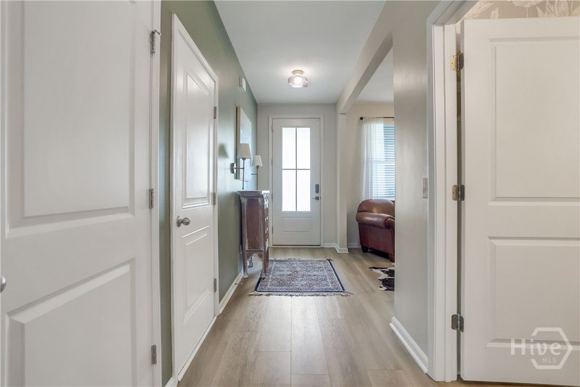 Welcome to this beautifully maintained 4-bedroom, 3-bath home in - photo 8