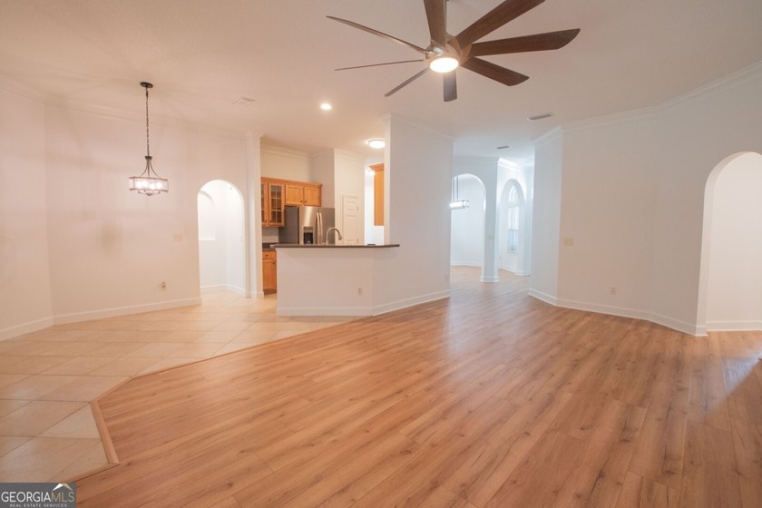 Beautiful well maintained home in Osprey Cove with brand new LVP - photo 11