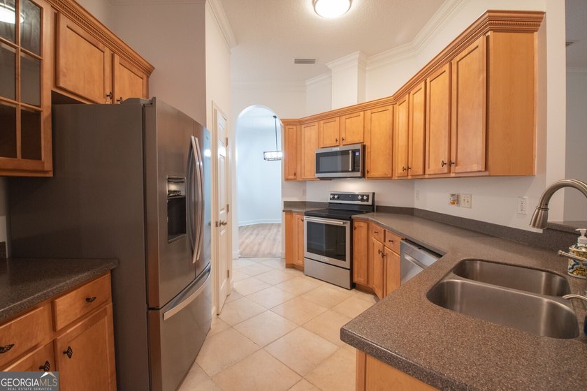 Beautiful well maintained home in Osprey Cove with brand new LVP - photo 31
