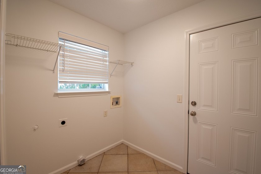 Beautiful well maintained home in Osprey Cove with brand new LVP - photo 32