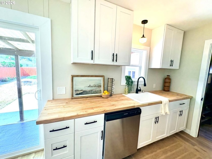 Completely remodeled and move-in ready! This beautifully updated - photo 8